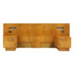 An Art Deco maple headboard,