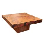 A rosewood and copper mounted coffee table,