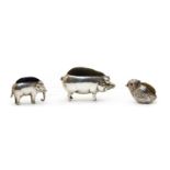 A novelty silver pin cushion in the form of a pig,