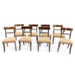 A set of eight Regency strung mahogany bar back dining chairs