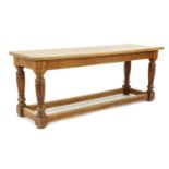A 19th century pale oak refectory table,