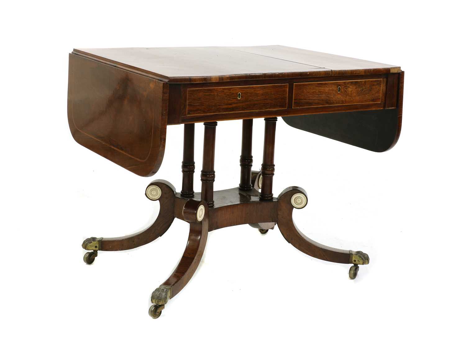 A Regency strung rosewood sofa table