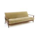 A teak 'Sunresta' sofa/daybed,