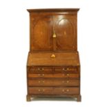 A George III oak and crossbanded bureau bookcase,