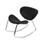 A contemporary chrome rocking chair,