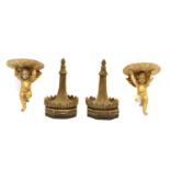 A pair of carved giltwood wall brackets