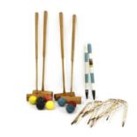An early 20th century croquet set,