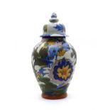 A Gouda pottery vase and cover,