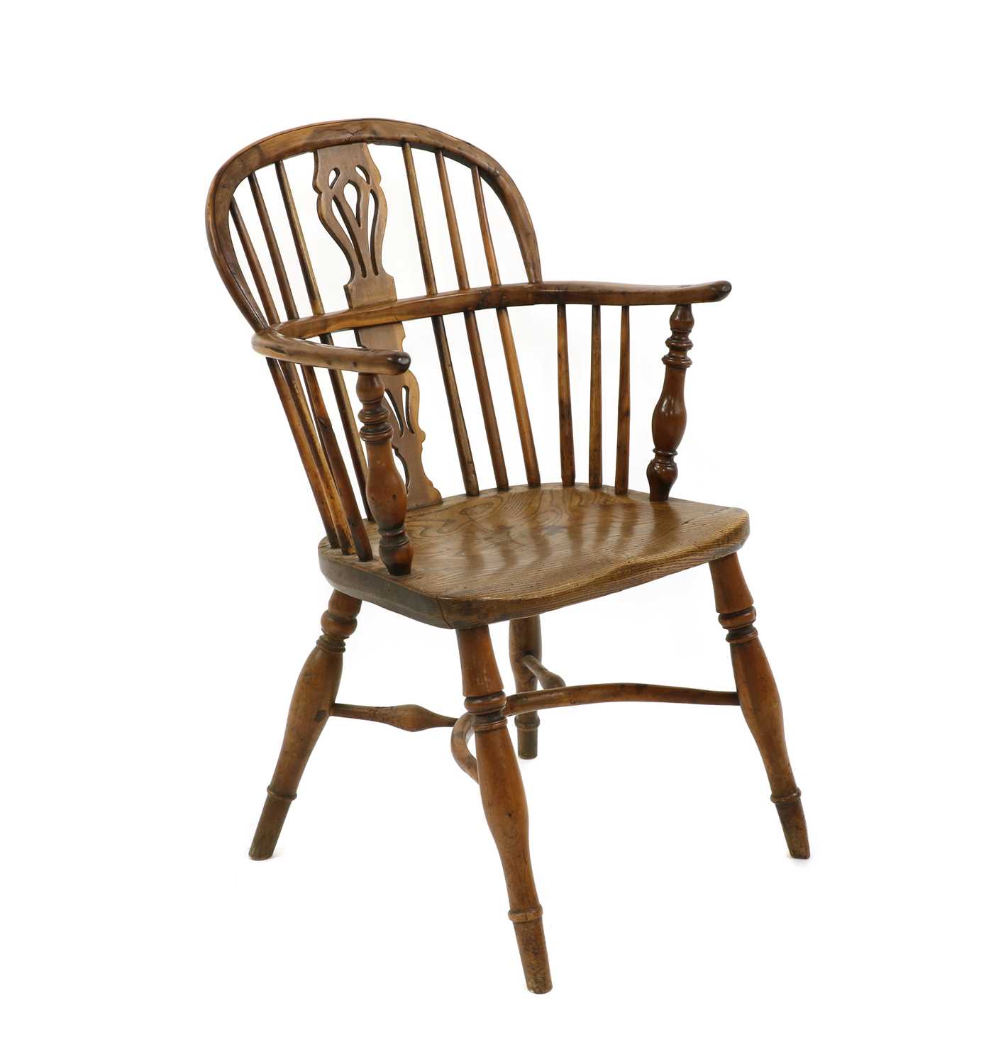 A yew wood and elm low back Windsor chair