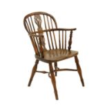A yew wood and elm low back Windsor chair