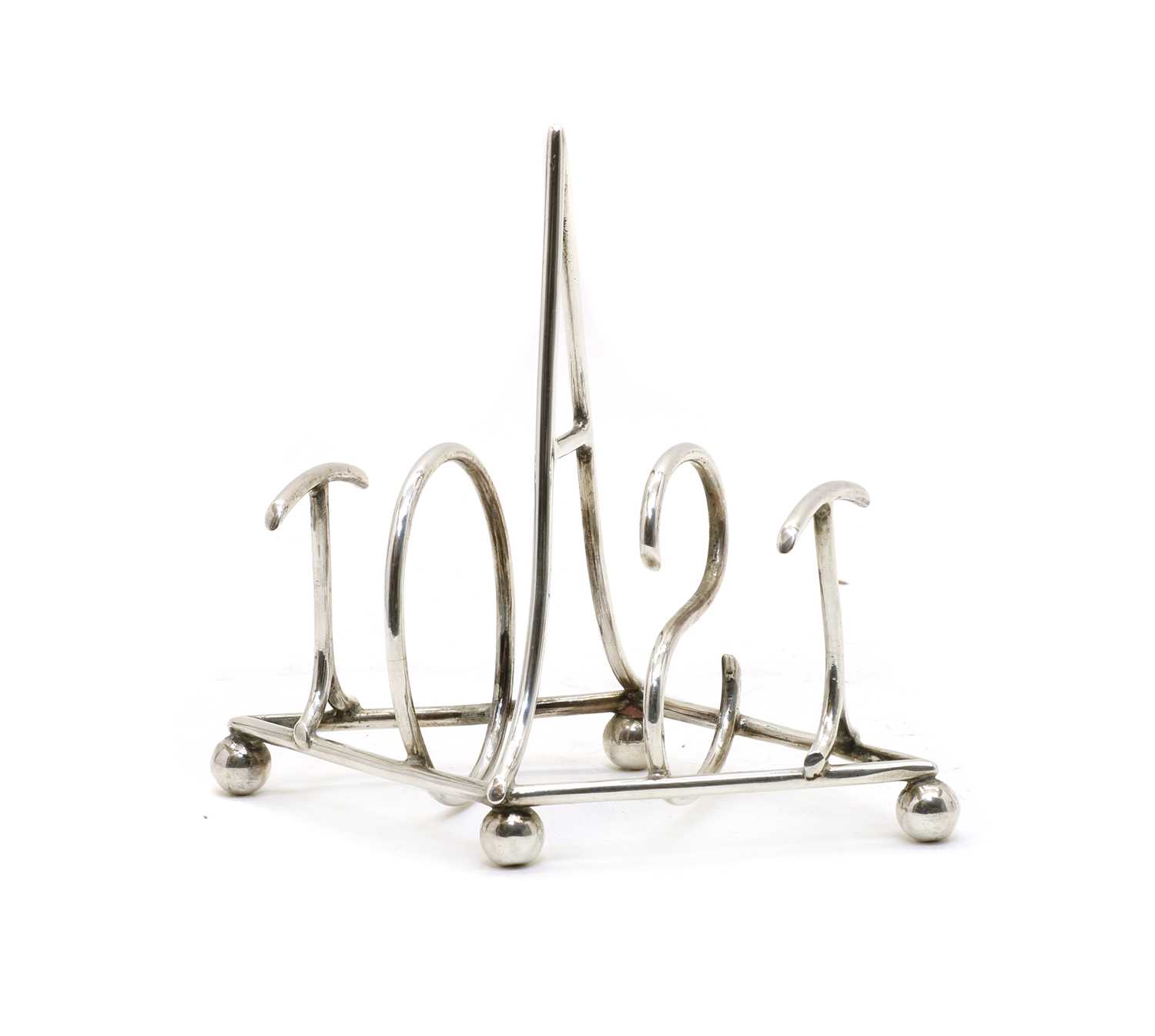 A novelty silver toast rack,