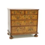 A William and Mary walnut chest of drawers