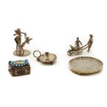 A collection of silver and plated miniature items