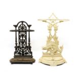 Two Victorian style cast iron stick stands,