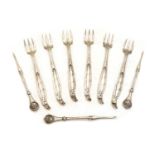 A set of six sterling silver hors d'oeuvres forks,