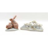 A Herend porcelain figure group modelled as two rabbits