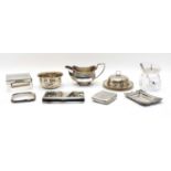 Eight various silver items and a silver mounted pot,