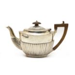 A late Victorian silver teapot,