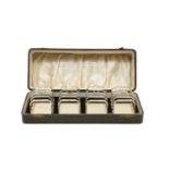 A cased set of four Art Deco silver four division toast racks