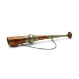 A copper and nickel hunting horn,