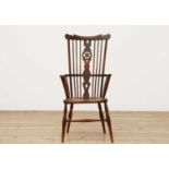 A George III fruitwood and elm high comb back Windsor chair,