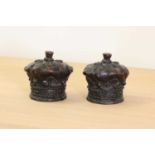 A pair of bronze finials,