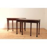 A pair of mahogany console tables,