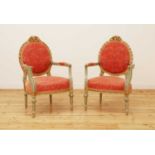 A pair of Continental painted and parcel-gilt fauteuils,