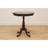 An octagonal walnut and specimen marble-topped table,
