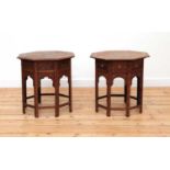 A near pair of Indian octagonal teak occasional tables