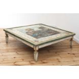 A large Continental painted wood coffee table,