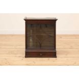 An oak tabletop cabinet,