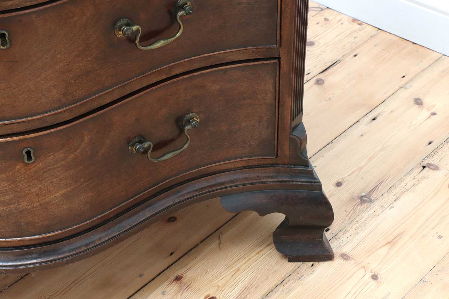 A George III serpentine mahogany chest of drawers, - Image 9 of 11