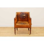 A Regency buttoned-leather upholstered library armchair,