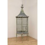 A large painted zinc chateau birdcage,