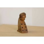 A carved wooden hurdy-gurdy stock head,