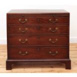 A George III mahogany caddy-top chest of drawers,