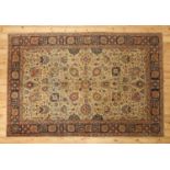 A Persian wool rug,