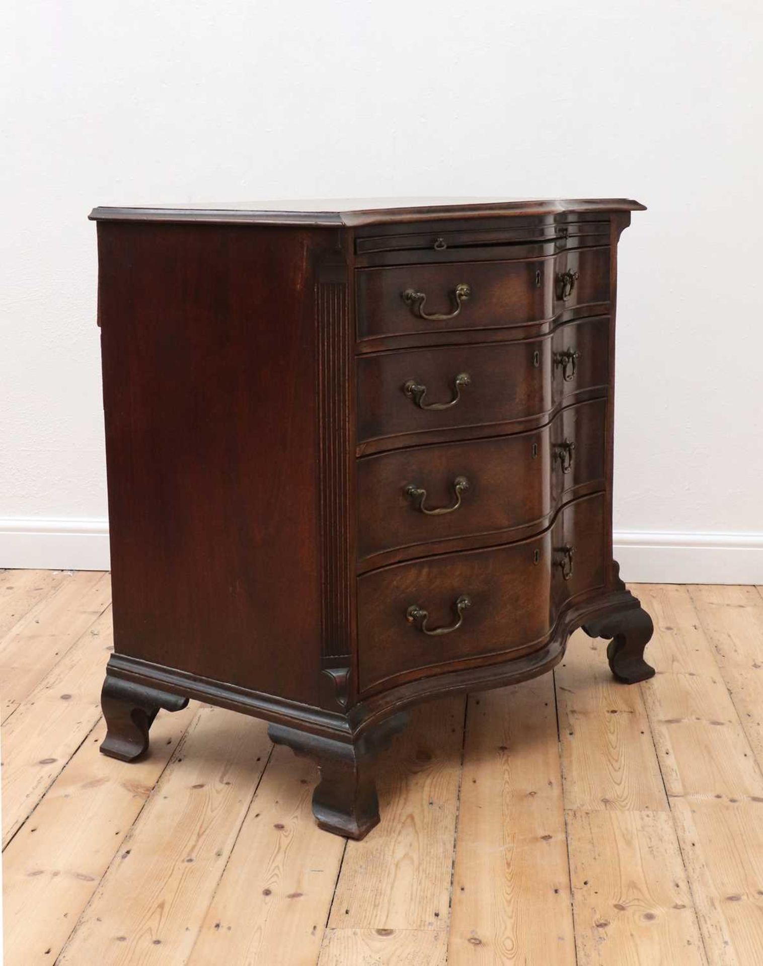 A George III serpentine mahogany chest of drawers, - Image 4 of 11