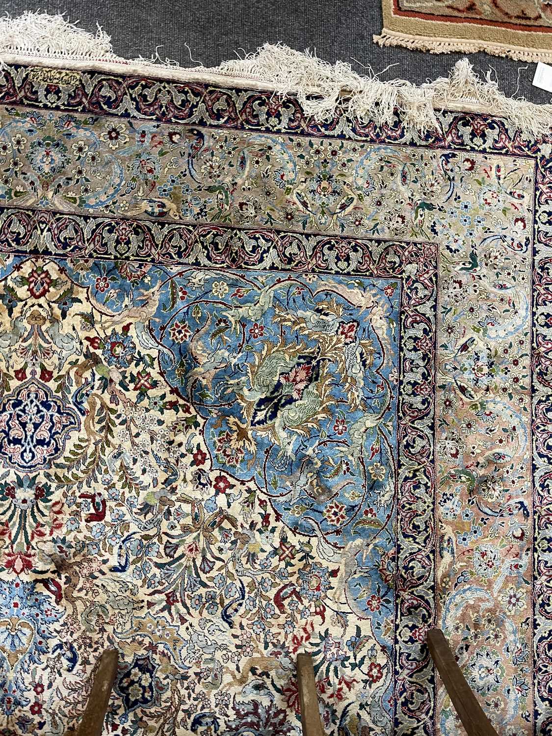 A Persian silk carpet, - Image 19 of 23