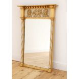 A Regency-style gilt and painted pier mirror,