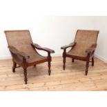 A pair of Indian teak planter's chairs,