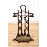 A faux bois cast iron corner stick stand,