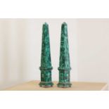 A pair of malachite obelisks,
