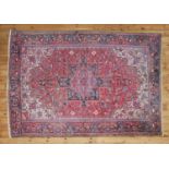 A Persian wool carpet,