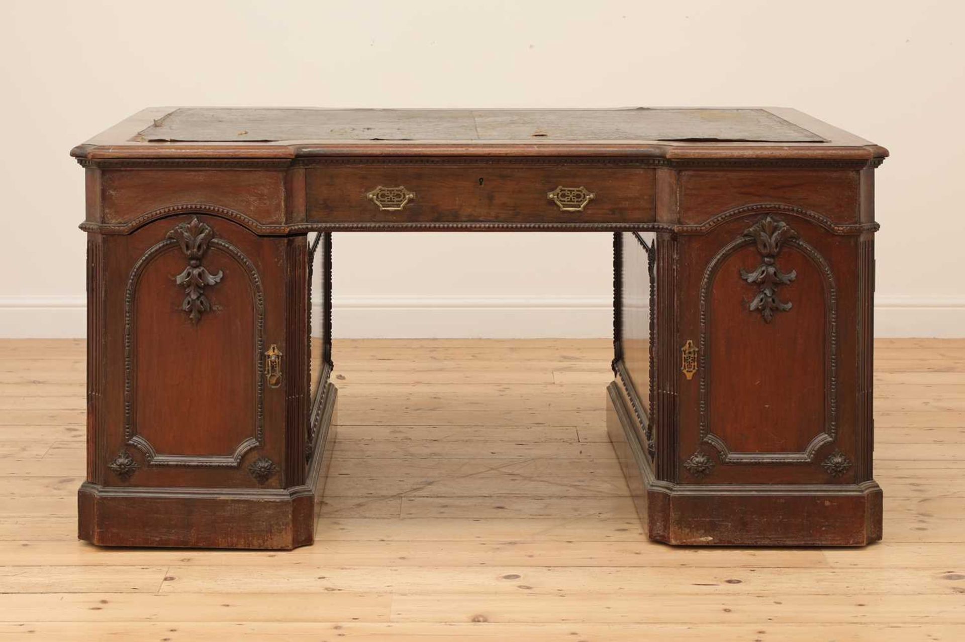 A George III-style walnut partners' desk,