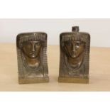 A pair of Egyptian-style bronze furniture mounts,