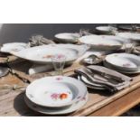 A German porcelain part dinner service by KPM,