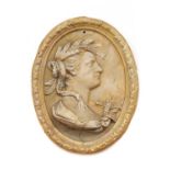 A plaster roundel depicting Demeter,