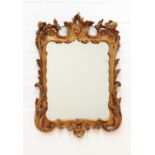 A George III carved giltwood mirror,